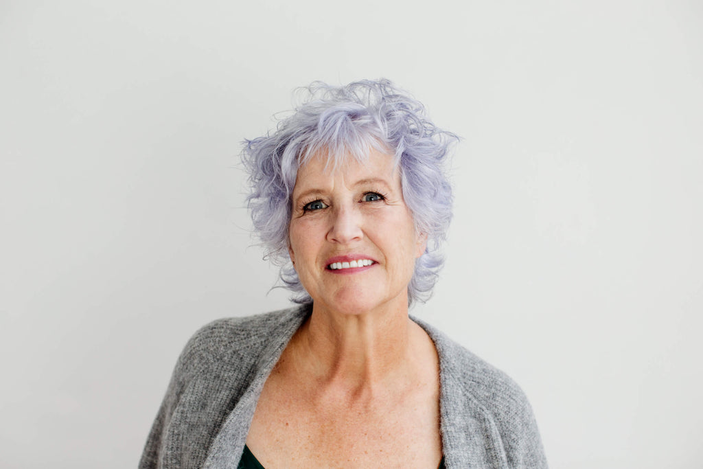 Woman with silver purple hair. 