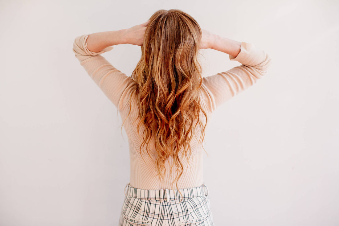 Woman with long red hair.